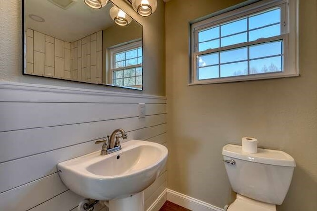 bathroom with toilet and sink