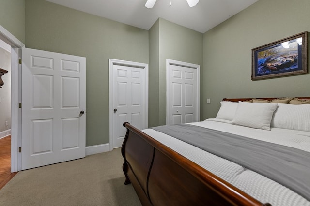 1726 Watercrest Way # B, Young Harris, GA 30582 - bedroom featuring light colored carpet, a ceiling fan, two closets, and baseboards