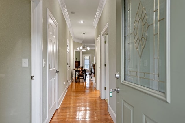 1726 Watercrest Way # B, Young Harris, GA 30582 - foyer entrance featuring ornamental molding, a chandelier, light wood-style flooring, and baseboards