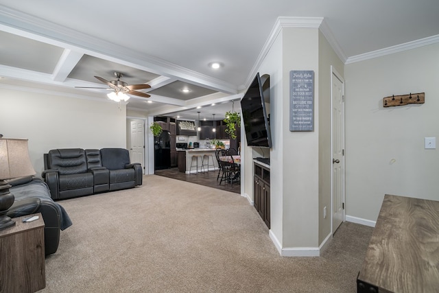 living room with carpet, beam ceiling, ornamental molding, coffered ceiling, and baseboards