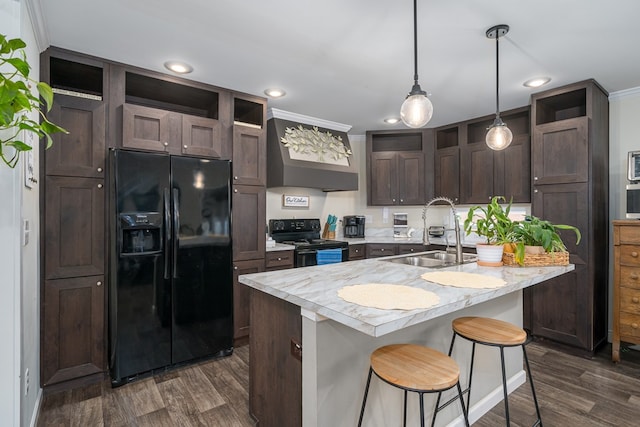 kitchen with open shelves, light countertops, a sink, dark brown cabinets, and black appliances