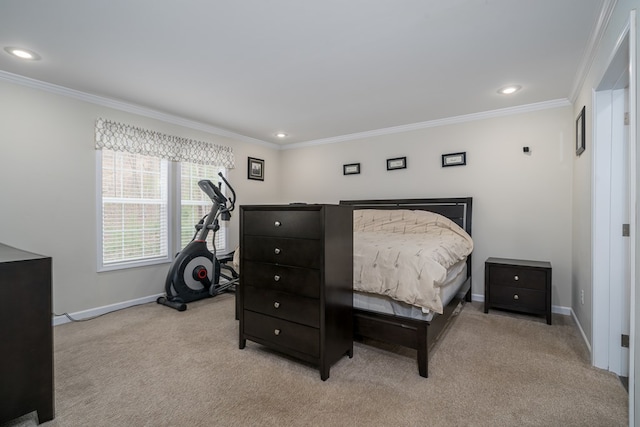 bedroom featuring baseboards, crown molding, and light colored carpet