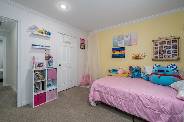 carpeted bedroom with ornamental molding and baseboards