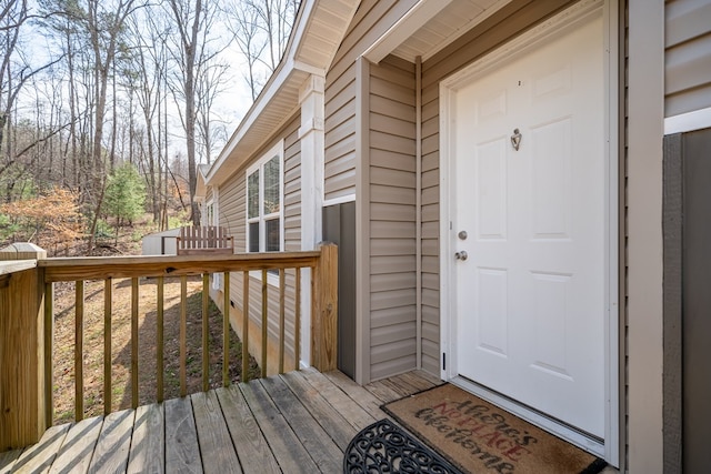 doorway to property featuring a deck