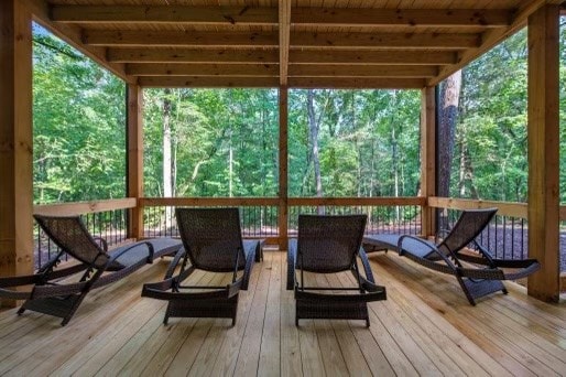241 Lees Ride, Mccaysville, GA 30555 - wooden deck featuring a wooded view