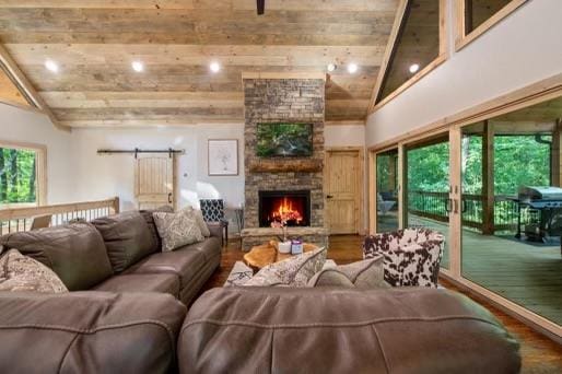 241 Lees Ride, Mccaysville, GA 30555 - living area featuring wood finished floors, wood ceiling, a stone fireplace, and recessed lighting