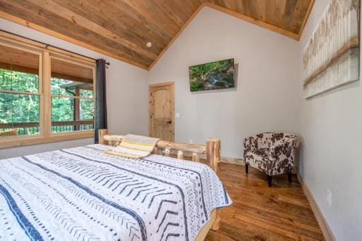 241 Lees Ride, Mccaysville, GA 30555 - bedroom with wood finished floors, lofted ceiling, wood ceiling, and baseboards
