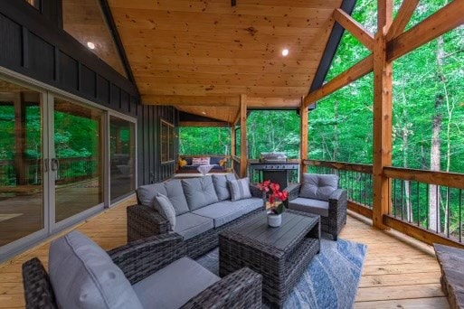 241 Lees Ride, Mccaysville, GA 30555 - sunroom / solarium featuring vaulted ceiling, an outdoor living space, and plenty of natural light