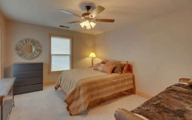 600 Mill Ridge Rd, Hiawassee, GA 30546 - carpeted bedroom with baseboards, ceiling fan, and visible vents