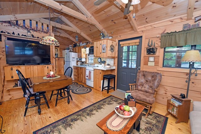 living room featuring light hardwood / wood-style flooring, wooden walls, and wooden ceiling