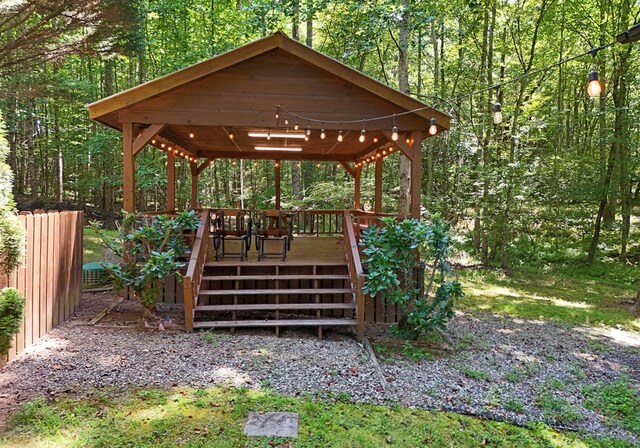 surrounding community with a gazebo and a deck