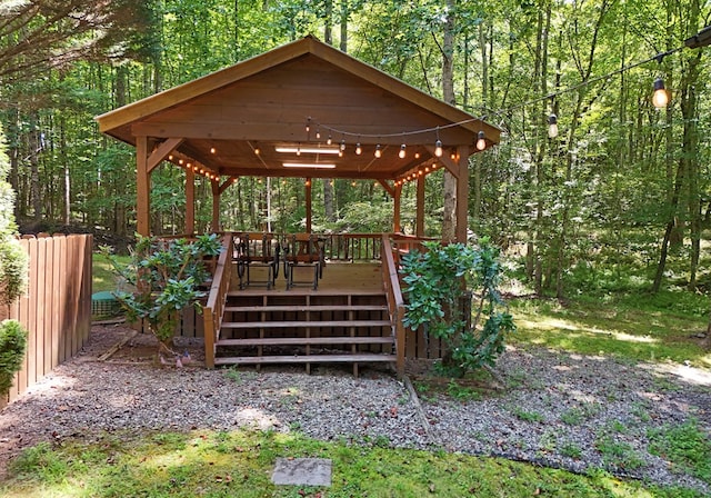 exterior space with a deck and a gazebo