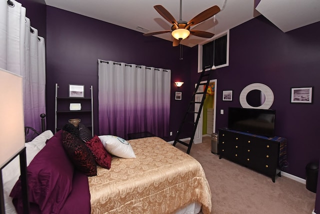 bedroom featuring ceiling fan, baseboards, visible vents, and carpet floors