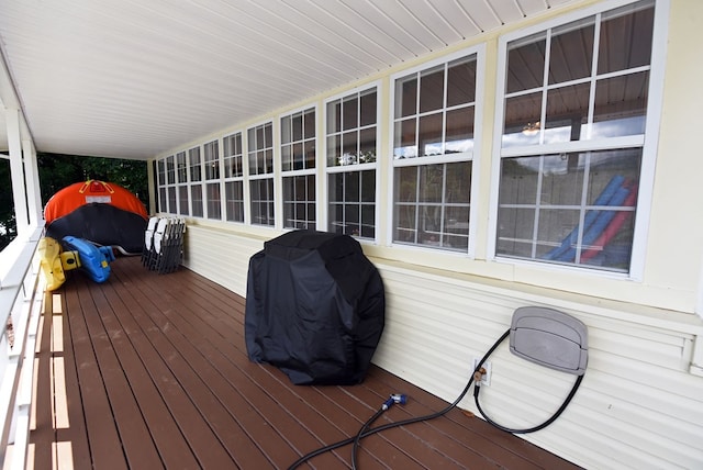 wooden terrace with grilling area