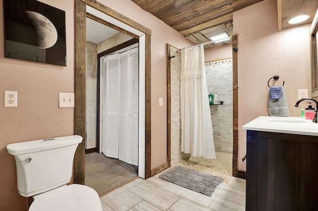 bathroom with vanity, toilet, wood ceiling, and a shower with curtain