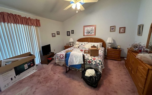 bedroom featuring lofted ceiling, ceiling fan, and carpet flooring