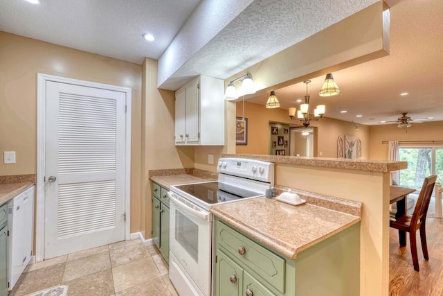 kitchen featuring white electric stove, ceiling fan with notable chandelier, and a textured ceiling