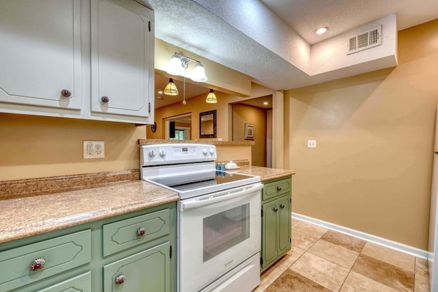 kitchen with green cabinetry, a textured ceiling, and white electric stove