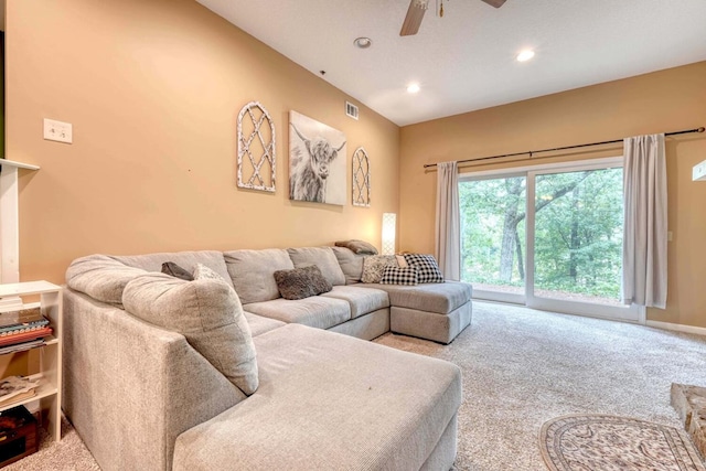 living room featuring carpet flooring and ceiling fan