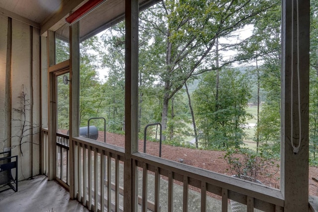 unfurnished sunroom with a wealth of natural light