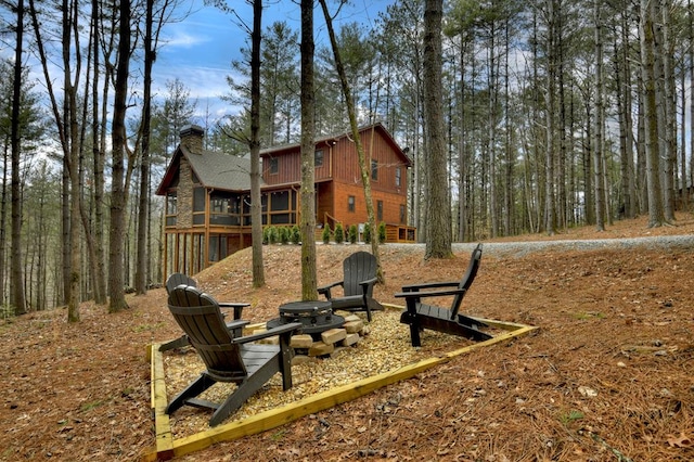 view of playground featuring a fire pit