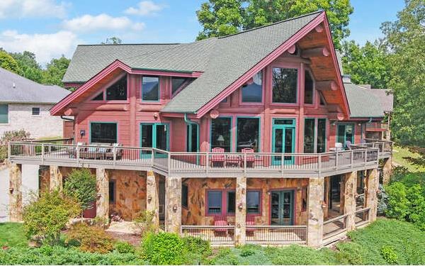 back of house with a balcony