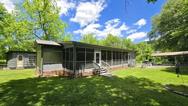 5451 Sampson Rd, Young Harris, GA 30582 - rear view of house featuring a sunroom and crawl space