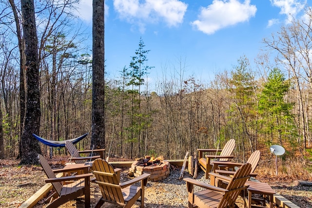 view of patio with a fire pit