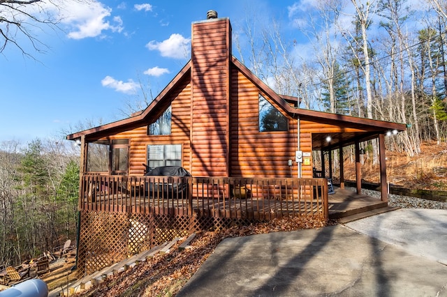 view of home's exterior with a deck