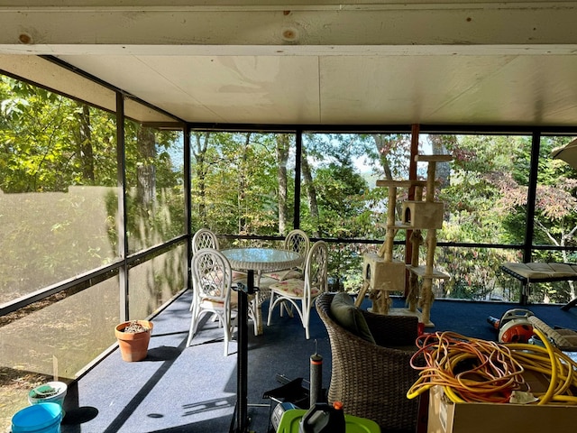 unfurnished sunroom featuring plenty of natural light