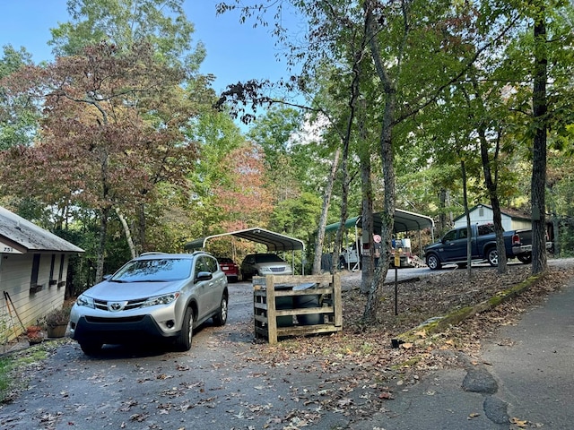 exterior space with a carport