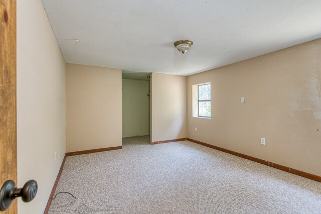1244 Cook Creek Rd, Murphy, NC 28906 - carpeted empty room with baseboards