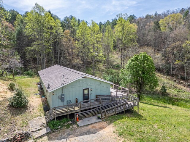 1244 Cook Creek Rd, Murphy, NC 28906 - exterior space featuring a front yard, a deck, and a forest view