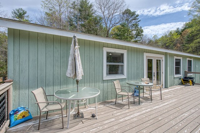 1244 Cook Creek Rd, Murphy, NC 28906 - wooden terrace with french doors and outdoor dining space