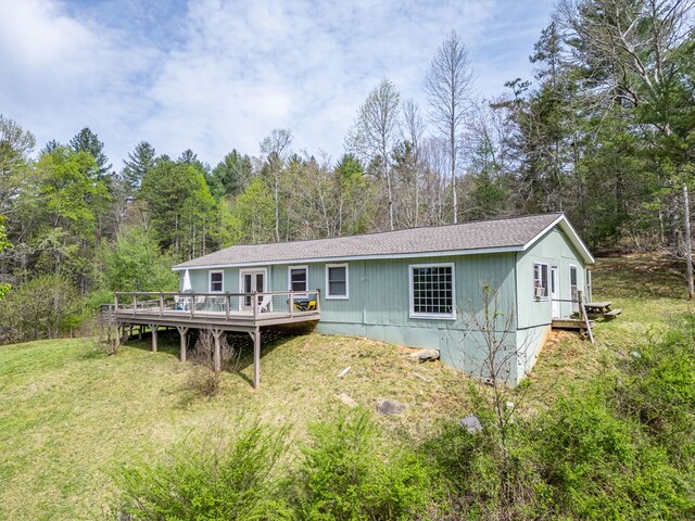 1244 Cook Creek Rd, Murphy, NC 28906 - back of house featuring a lawn, roof with shingles, a deck, and a wooded view