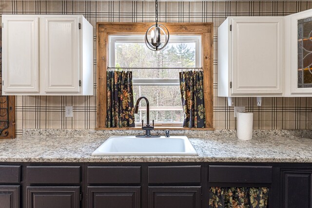 1244 Cook Creek Rd, Murphy, NC 28906 - kitchen featuring a sink, glass insert cabinets, plenty of natural light, and white cabinetry