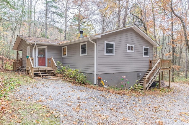 view of front of home featuring stairway