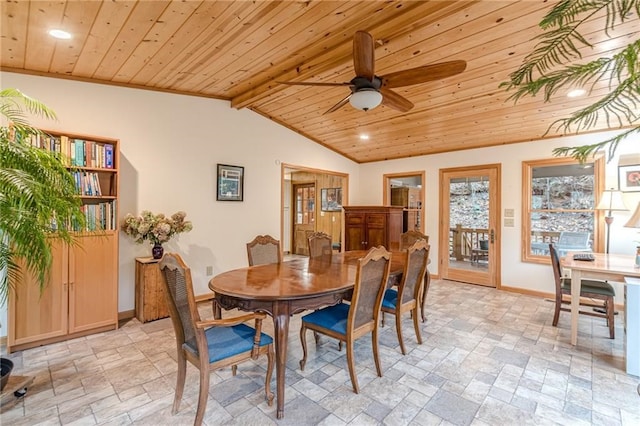 dining space featuring stone tile floors, a ceiling fan, baseboards, vaulted ceiling, and wood ceiling