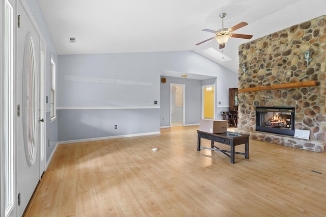 59 Tusquittee Creek Ln, Hayesville, NC 28904 - living area featuring a ceiling fan, lofted ceiling, a fireplace, wood finished floors, and baseboards
