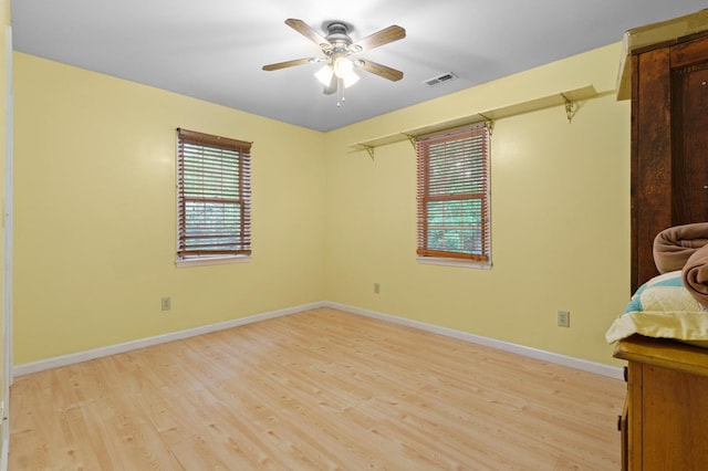 59 Tusquittee Creek Ln, Hayesville, NC 28904 - unfurnished room featuring light wood-style flooring, a ceiling fan, and baseboards