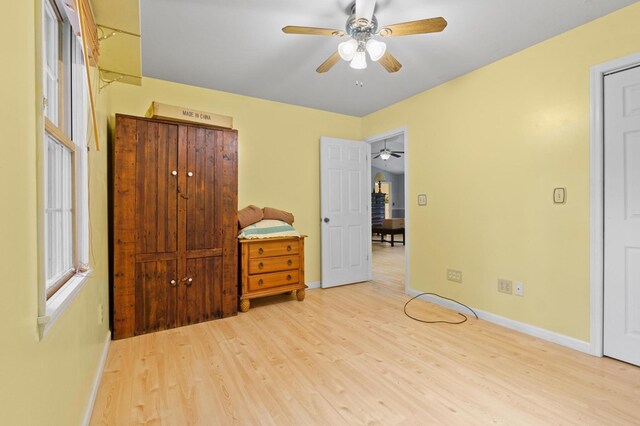 59 Tusquittee Creek Ln, Hayesville, NC 28904 - bedroom with wood finished floors, baseboards, and a ceiling fan
