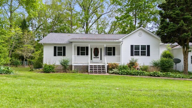 59 Tusquittee Creek Ln, Hayesville, NC 28904 - ranch-style house featuring covered porch, a front lawn, and roof with shingles