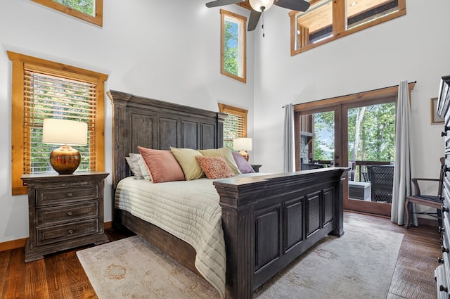 558 Tipton Springs Rd, Morganton, GA 30560 - bedroom with access to exterior, french doors, a high ceiling, multiple windows, and wood finished floors