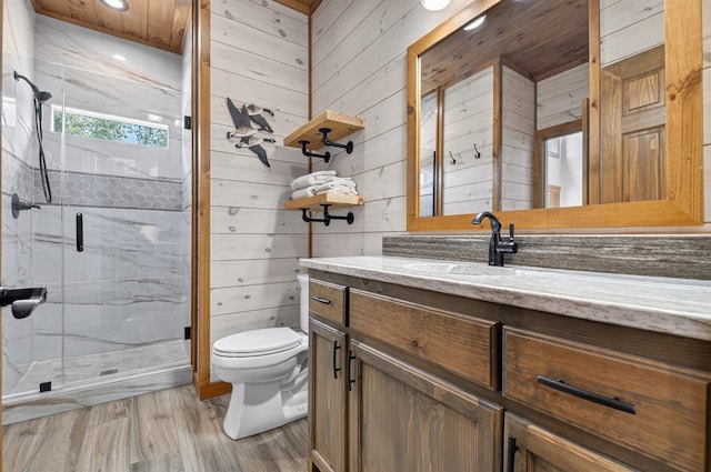 558 Tipton Springs Rd, Morganton, GA 30560 - full bath featuring vanity, toilet, a marble finish shower, wood finished floors, and wooden walls