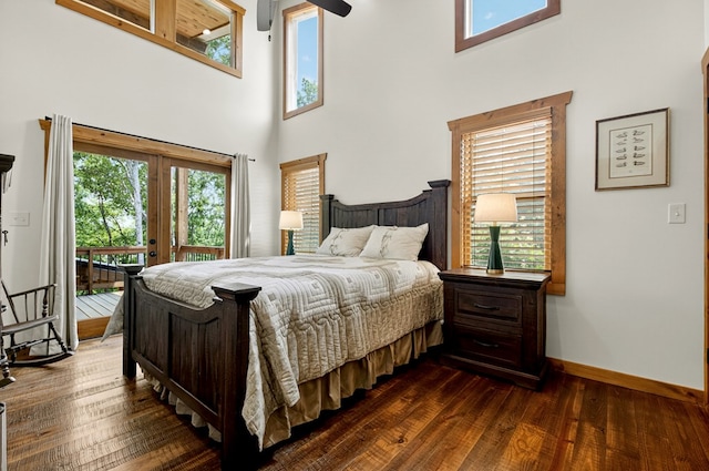 558 Tipton Springs Rd, Morganton, GA 30560 - bedroom with access to outside, a high ceiling, dark wood-type flooring, and baseboards
