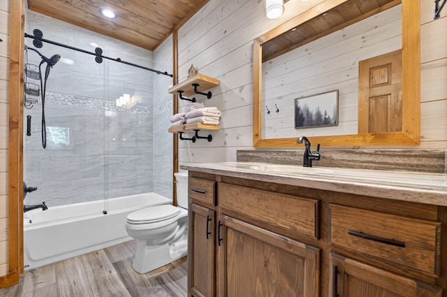 558 Tipton Springs Rd, Morganton, GA 30560 - full bathroom with vanity, wood ceiling, toilet, wood finished floors, and enclosed tub / shower combo