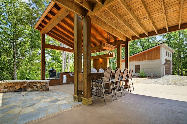 558 Tipton Springs Rd, Morganton, GA 30560 - view of patio / terrace featuring grilling area, an outbuilding, and a garage