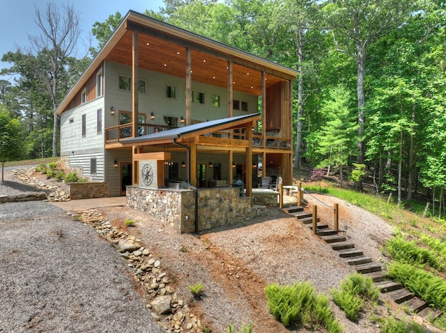 558 Tipton Springs Rd, Morganton, GA 30560 - rear view of house with a patio area