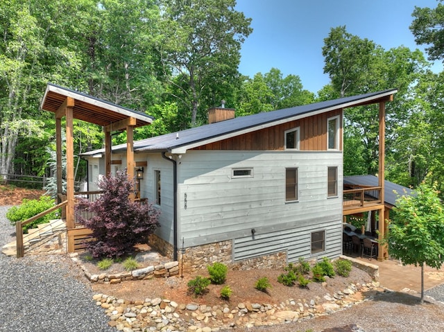 558 Tipton Springs Rd, Morganton, GA 30560 - view of home's exterior with a chimney and a deck