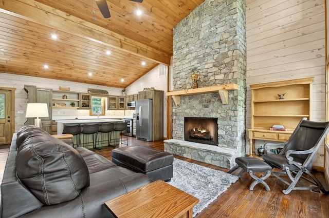 558 Tipton Springs Rd, Morganton, GA 30560 - living room with wood ceiling, dark wood-style floors, a ceiling fan, a fireplace, and high vaulted ceiling